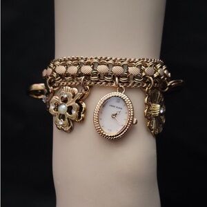 ANN KLEIN GOLD CHARMS BRACELET WATCH WITH SWAROVSKI CRYSTALS